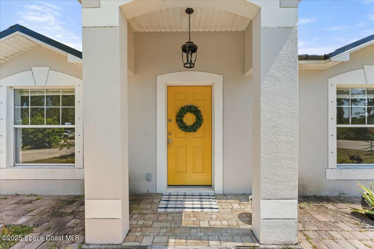 194 Saybrook Road Southwest Palm Bay, FL 32908 - Photo 2 of 35 a view of a entryway door of the house