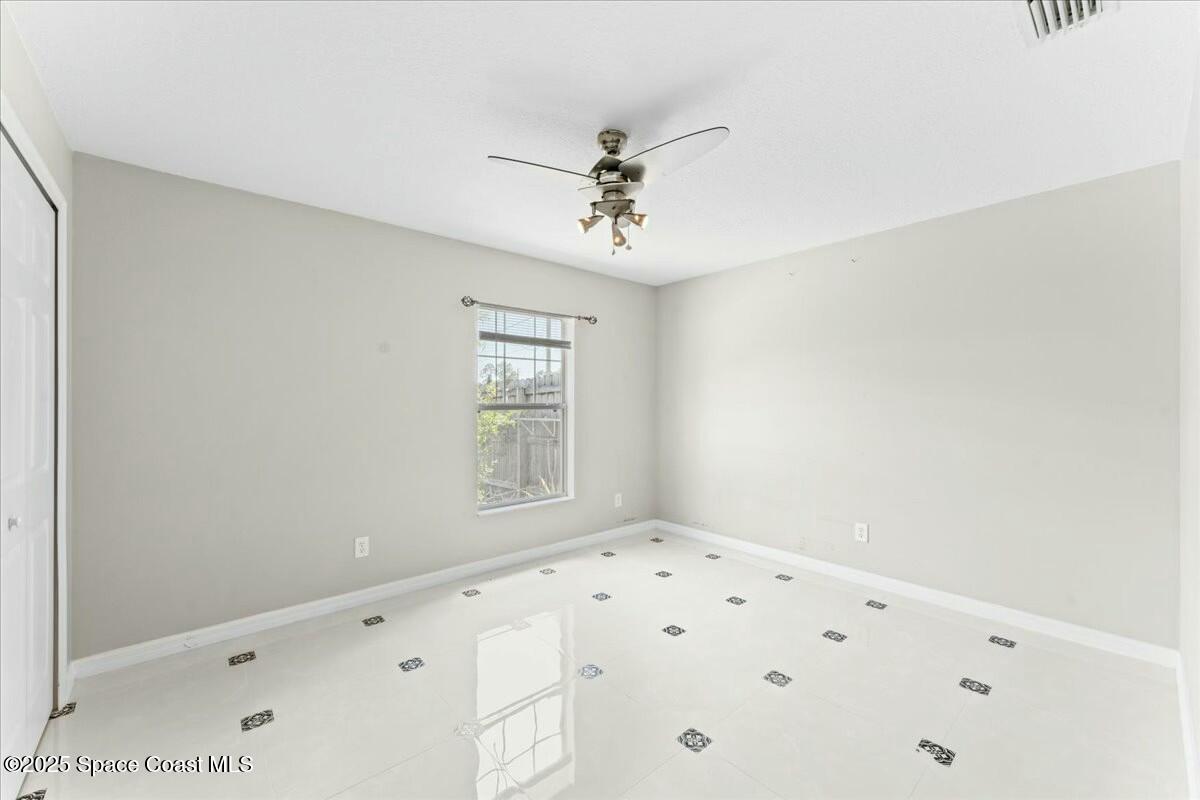 194 Saybrook Road Southwest Palm Bay, FL 32908 - Photo 25 of 35 a view of an empty room