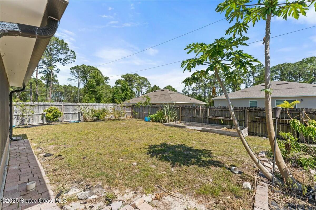 194 Saybrook Road Southwest Palm Bay, FL 32908 - Photo 27 of 35 a view of outdoor space yard and patio