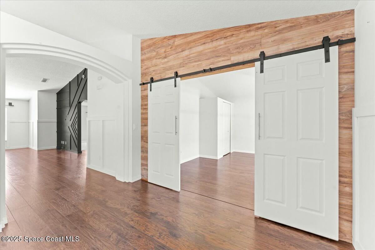 194 Saybrook Road Southwest Palm Bay, FL 32908 - Photo 7 of 35 a view of entryway with wooden floor