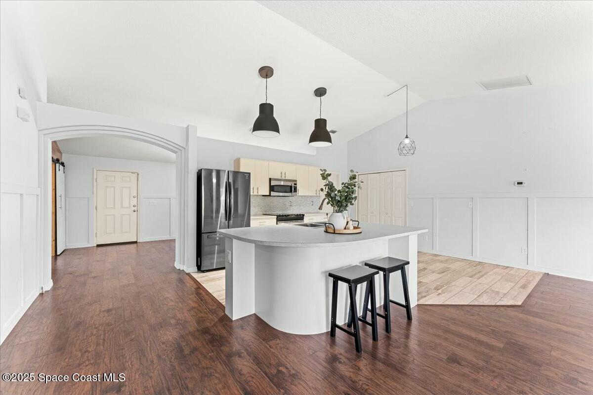 194 Saybrook Road Southwest Palm Bay, FL 32908 - Photo 10 of 35 a view of a kitchen and dining room