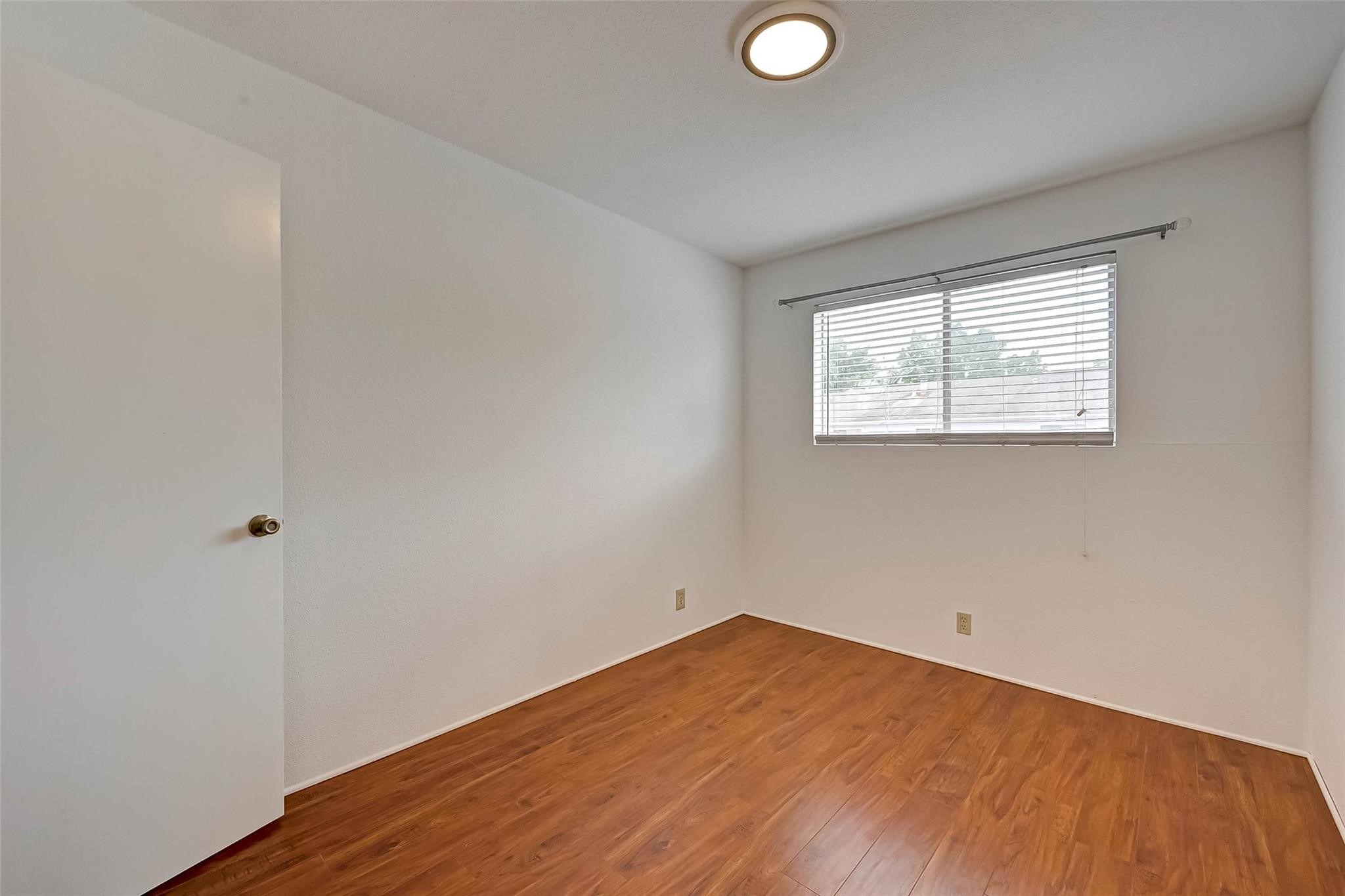 8101 Amelia Road, Unit 206 Houston, TX 77055 - Photo 22 of 32 an empty room with a window
