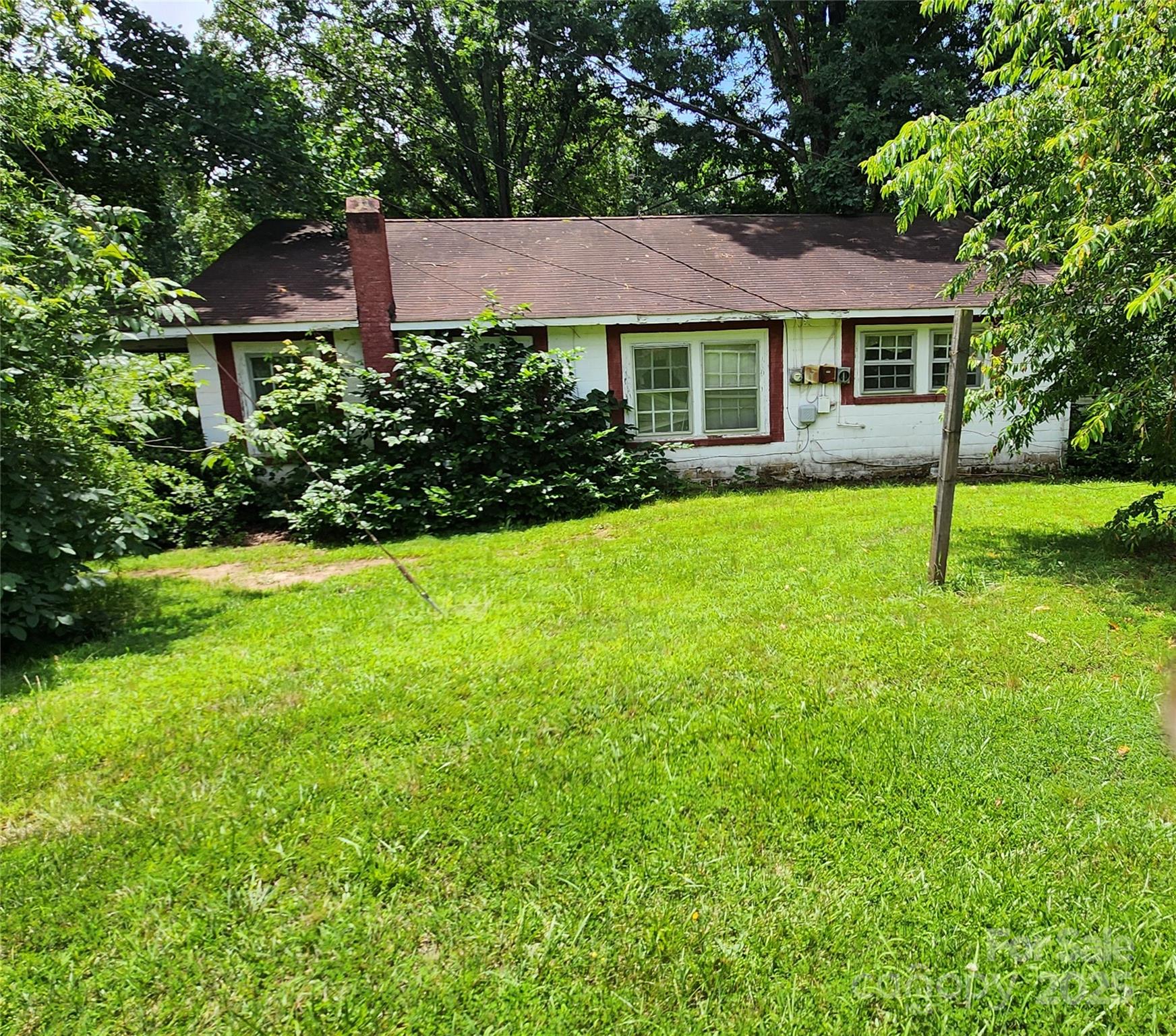 423 Tot Dellinger Road Cherryville, NC 28021 - Photo 3 of 14 a view of a house with a yard and a tree