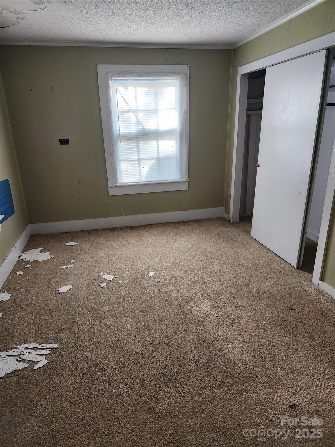 423 Tot Dellinger Road Cherryville, NC 28021 - Photo 8 of 14 an empty room with windows