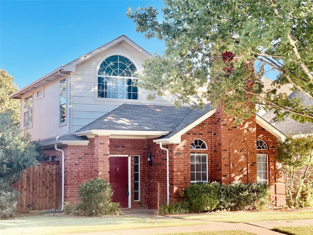 328 Raintree Drive Coppell, TX 75019 - Photo 1 of 1 a front view of a house with garden