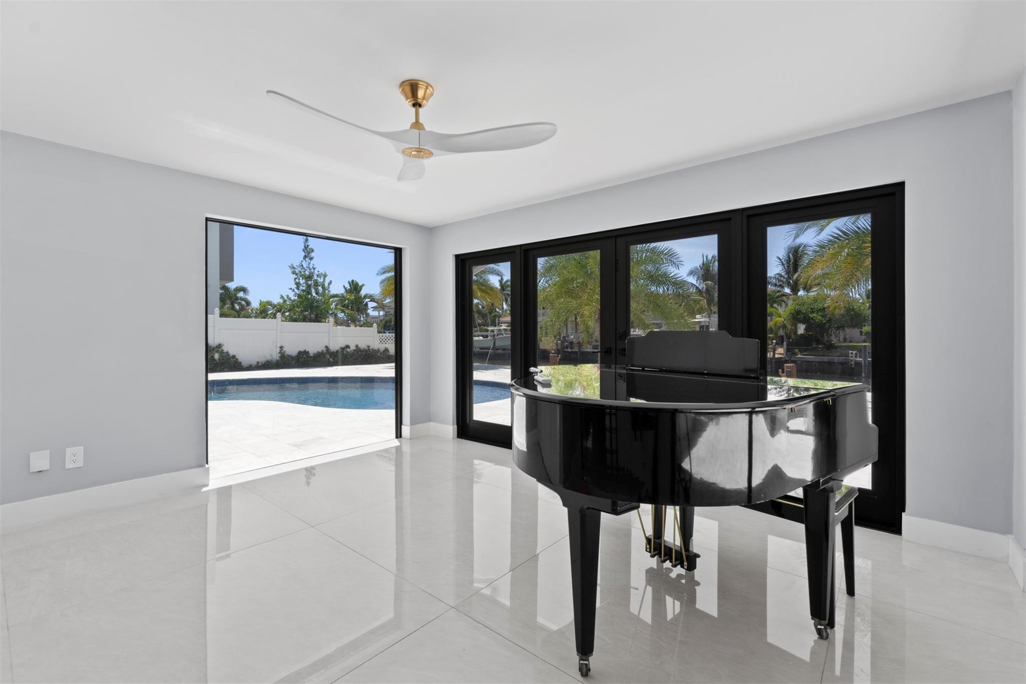 2310 Northeast 48th Court Lighthouse Point, FL 33064 - Photo 22 of 61 a view of a dining room with furniture window and outside view