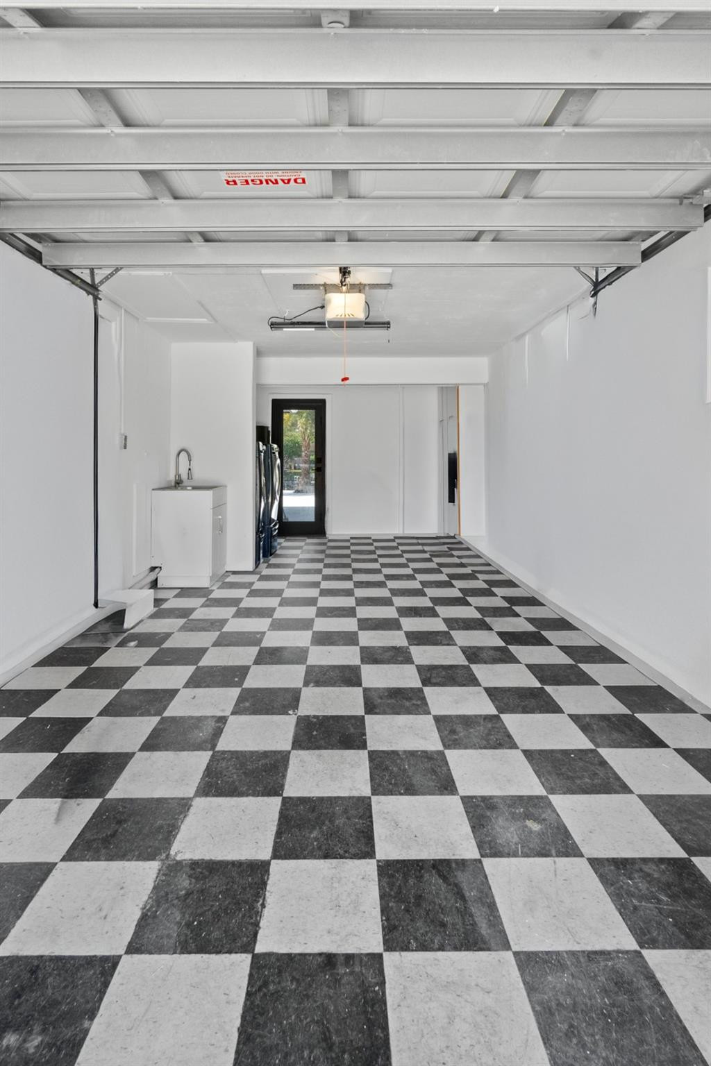 2310 Northeast 48th Court Lighthouse Point, FL 33064 - Photo 28 of 61 a view of a black and white checkered floor