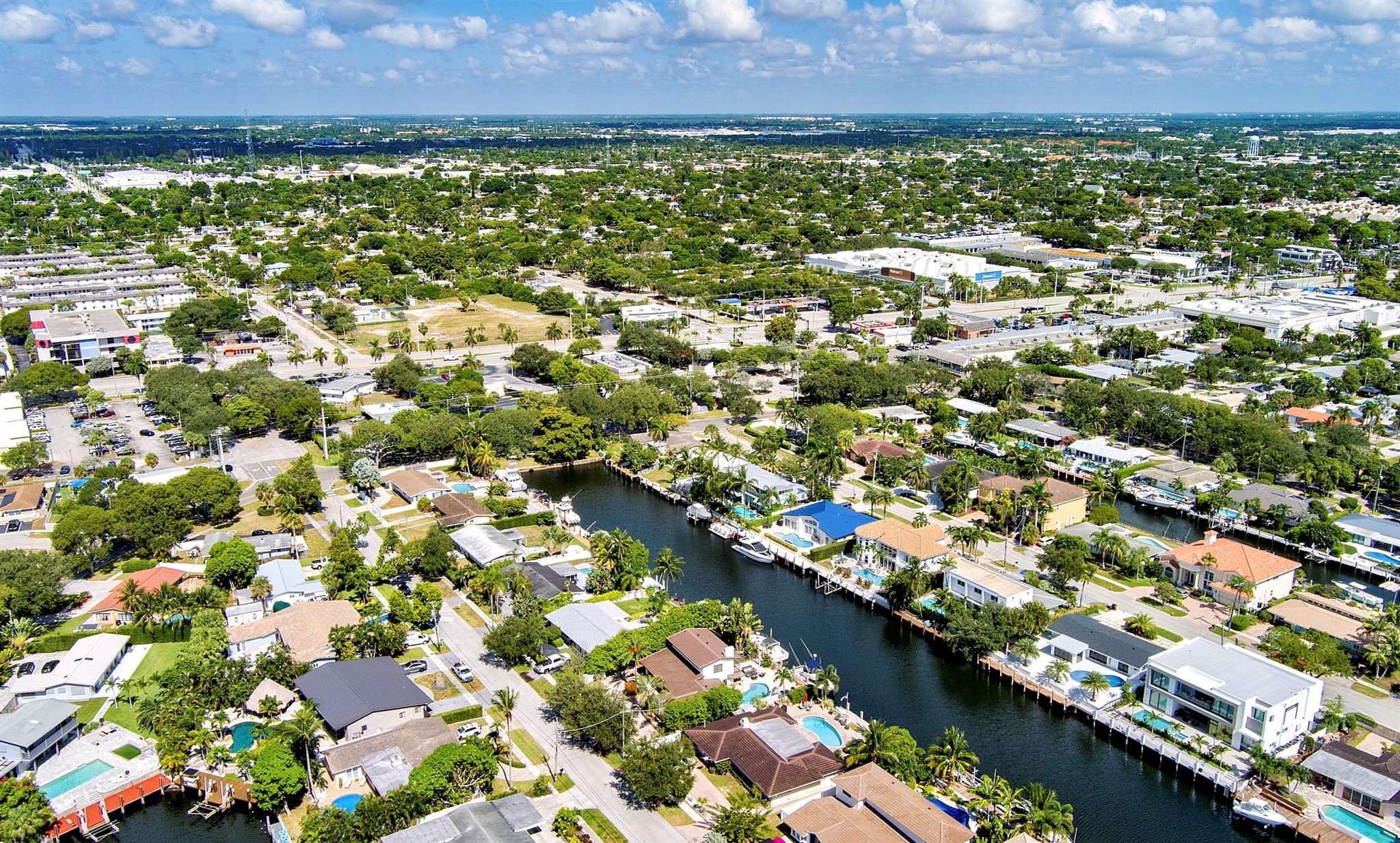 2310 Northeast 48th Court Lighthouse Point, FL 33064 - Photo 47 of 61 an aerial view of residential houses with outdoor space and trees