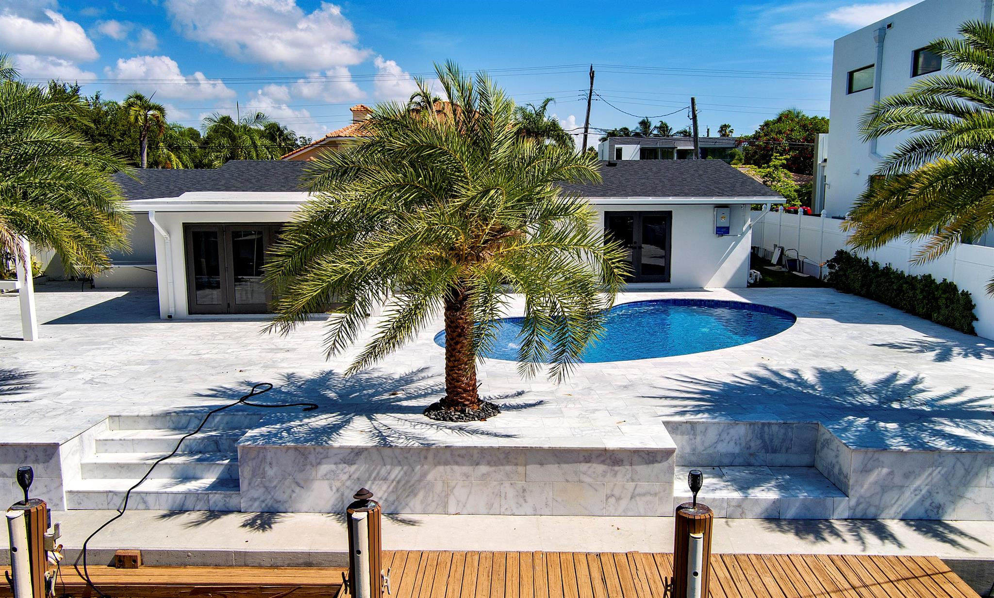 2310 Northeast 48th Court Lighthouse Point, FL 33064 - Photo 55 of 61 a view of a house with pool