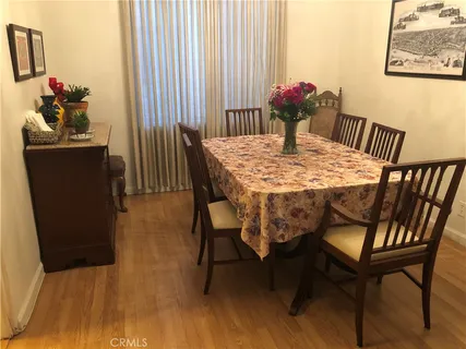 a bedroom with a bed and a desk