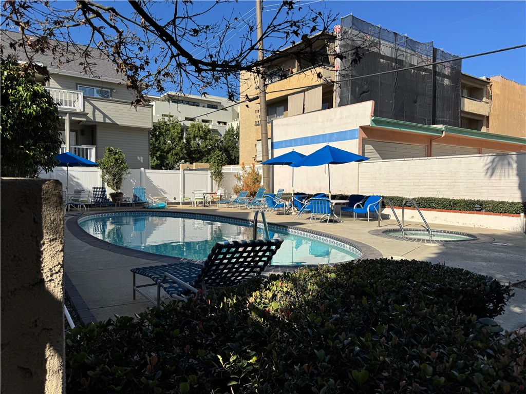 985 East California Boulevard Pasadena, CA 91106 - Photo 10 of 10 a view of a patio with table and chairs potted plants
