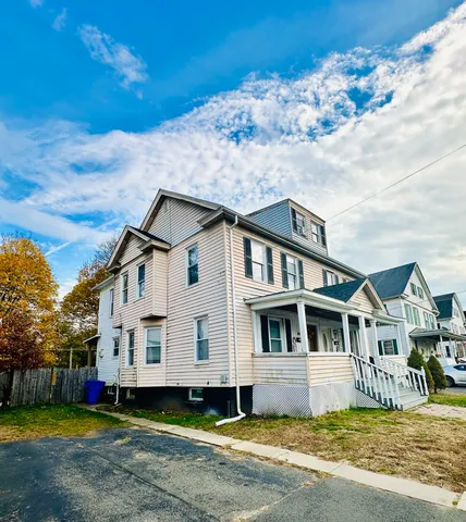 a house that has a big yard and more windows