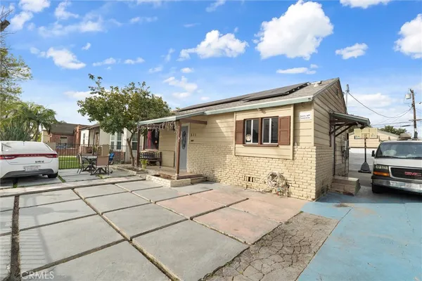 a view of a house with a patio