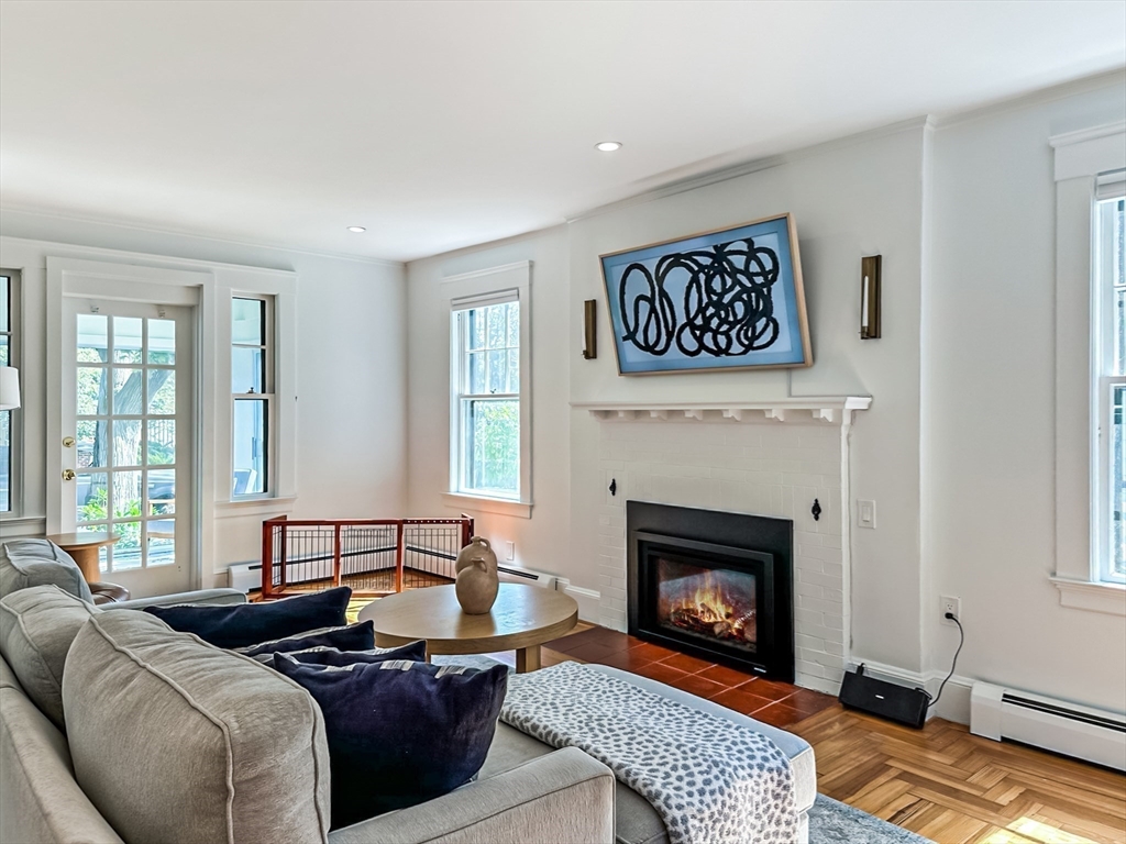 24 York Street Andover, MA 01810 - Photo 11 of 34 a living room with furniture a fireplace and window