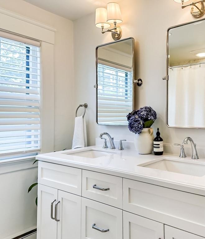 24 York Street Andover, MA 01810 - Photo 13 of 34 a bathroom with a sink and a mirror