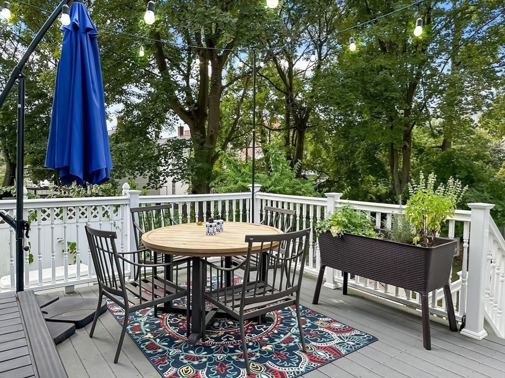 24 York Street Andover, MA 01810 - Photo 28 of 34 a view of a chair and table on the deck
