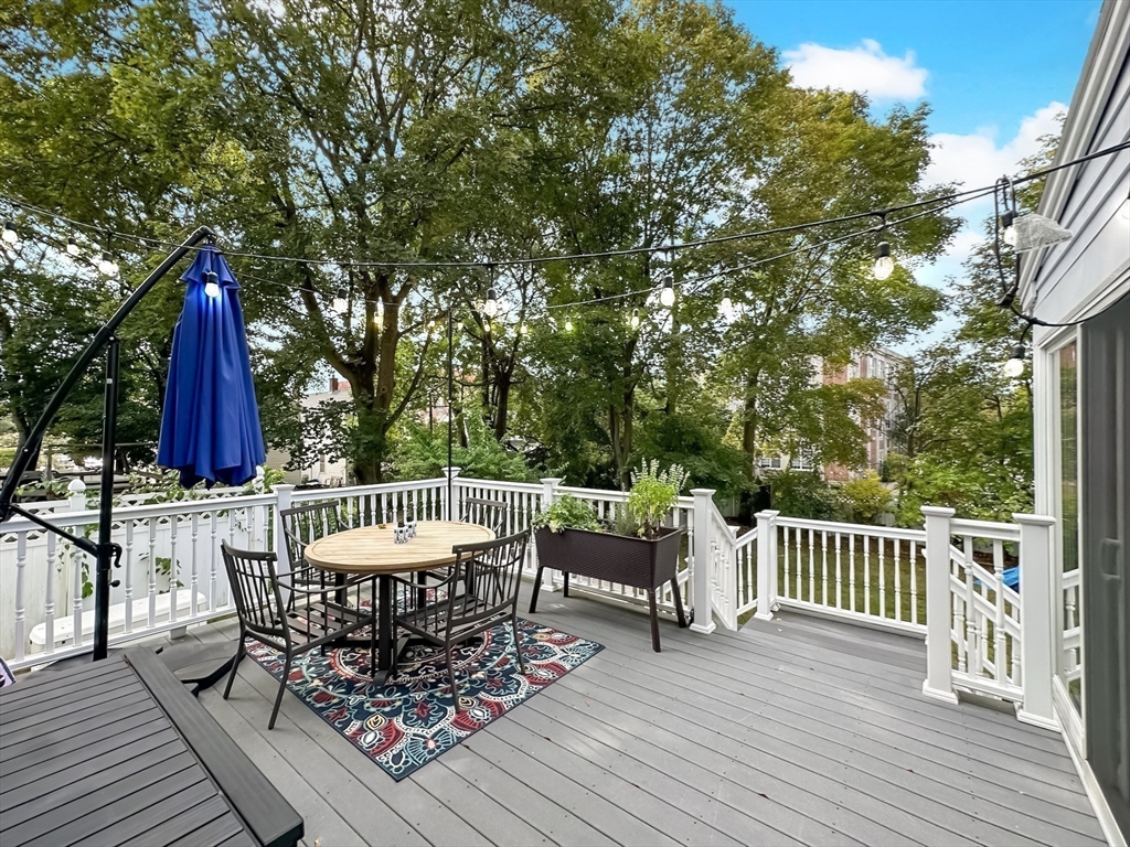 24 York Street Andover, MA 01810 - Photo 29 of 34 a view of a chairs and table on the wooden floor