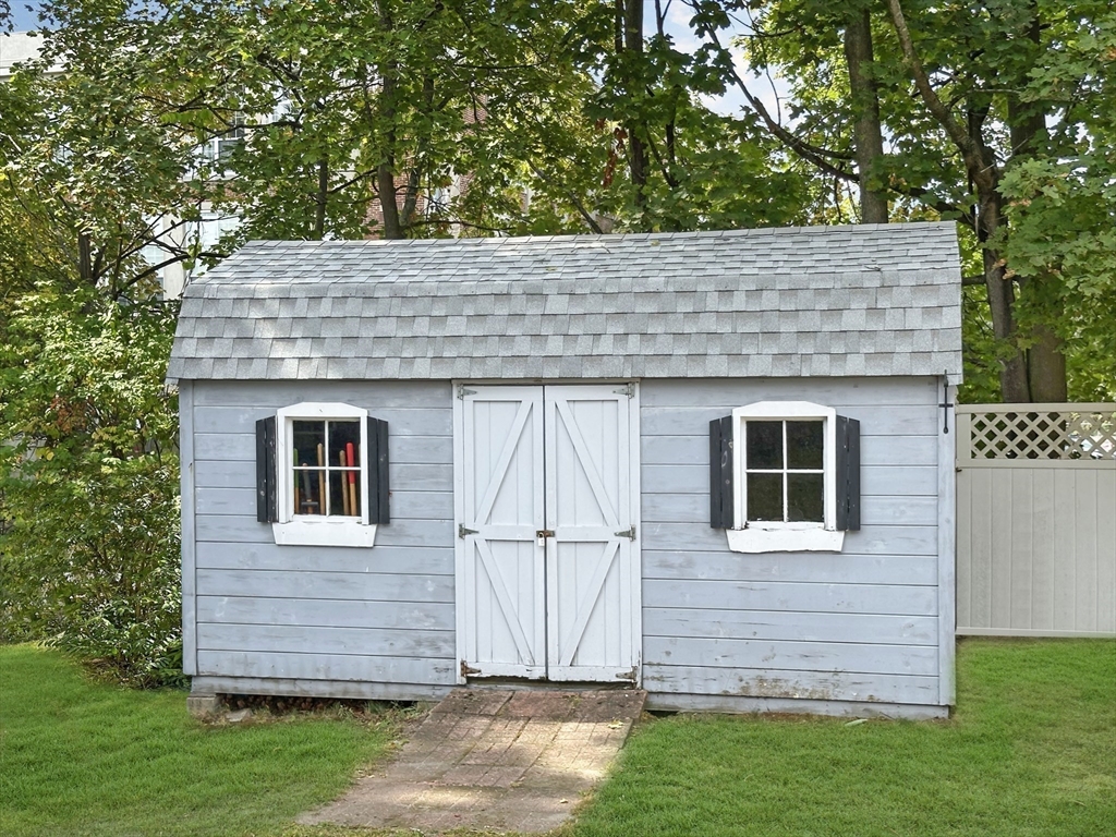 24 York Street Andover, MA 01810 - Photo 31 of 34 a view of a house with a yard