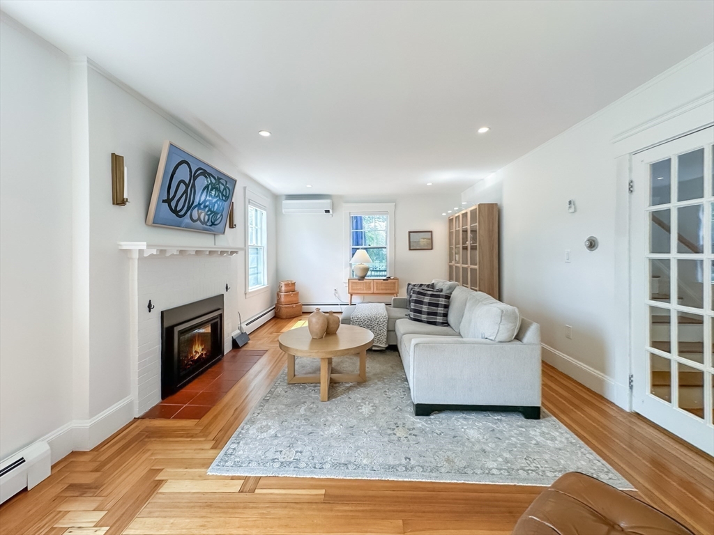 24 York Street Andover, MA 01810 - Photo 5 of 34 a living room with furniture and a fireplace
