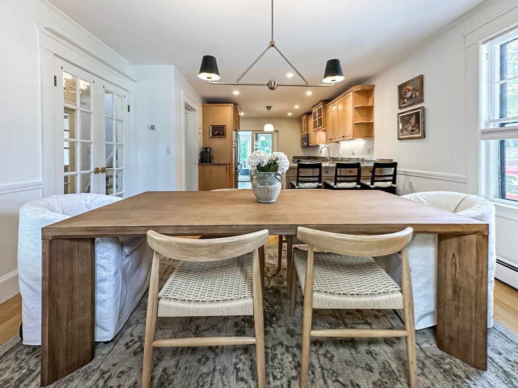 24 York Street Andover, MA 01810 - Photo 8 of 34 a view of a dining room with a table and chairs