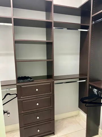 a living room with storage