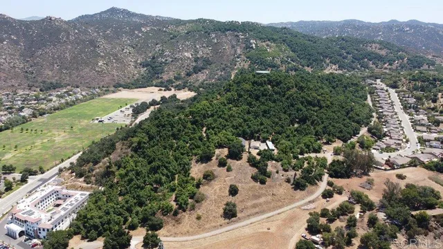 a view of a road with a yard