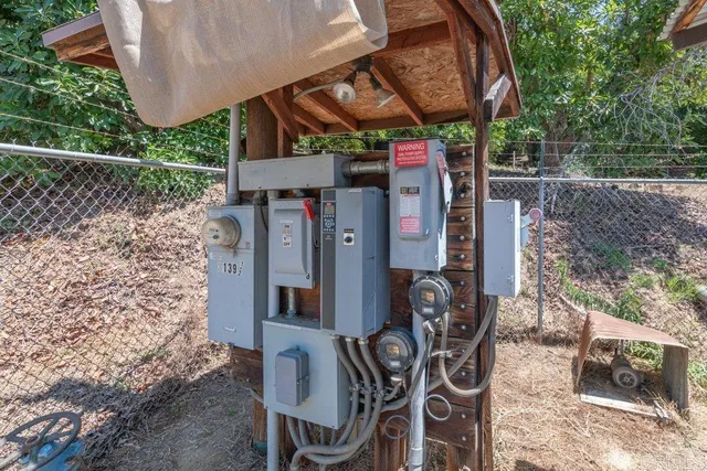 a house that has a tree in front of it