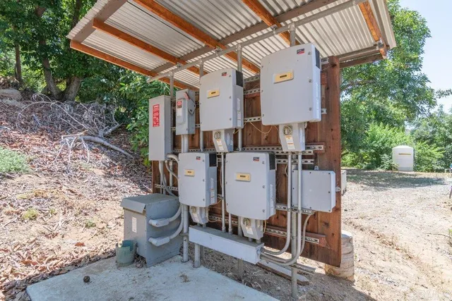 a view of balcony with wooden floor and fence