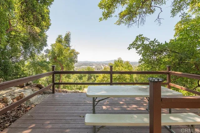 a view of a road with a building in the background