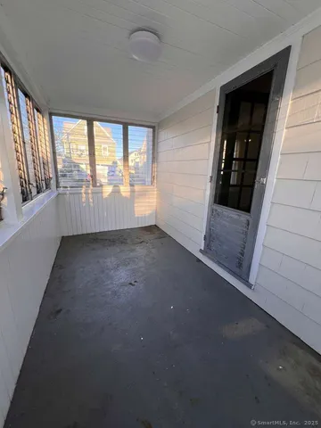 en empty room with windows