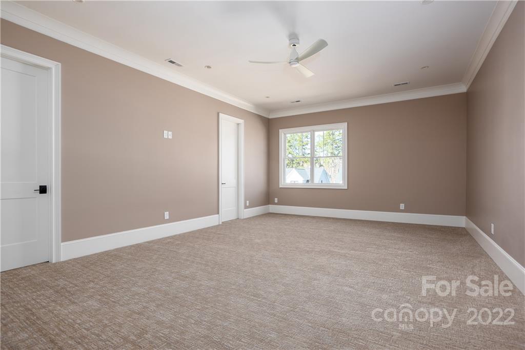 811 Naples Drive Davidson, NC 28036 - Photo 15 of 31 a view of an empty room with a window