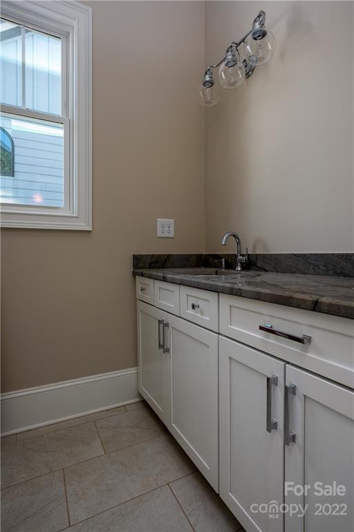 811 Naples Drive Davidson, NC 28036 - Photo 24 of 31 a view of a storage and utility room with closet