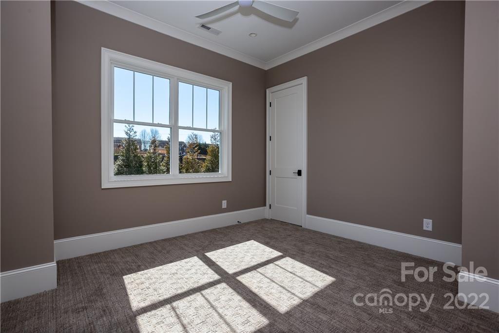 811 Naples Drive Davidson, NC 28036 - Photo 25 of 31 a view of an empty room and window