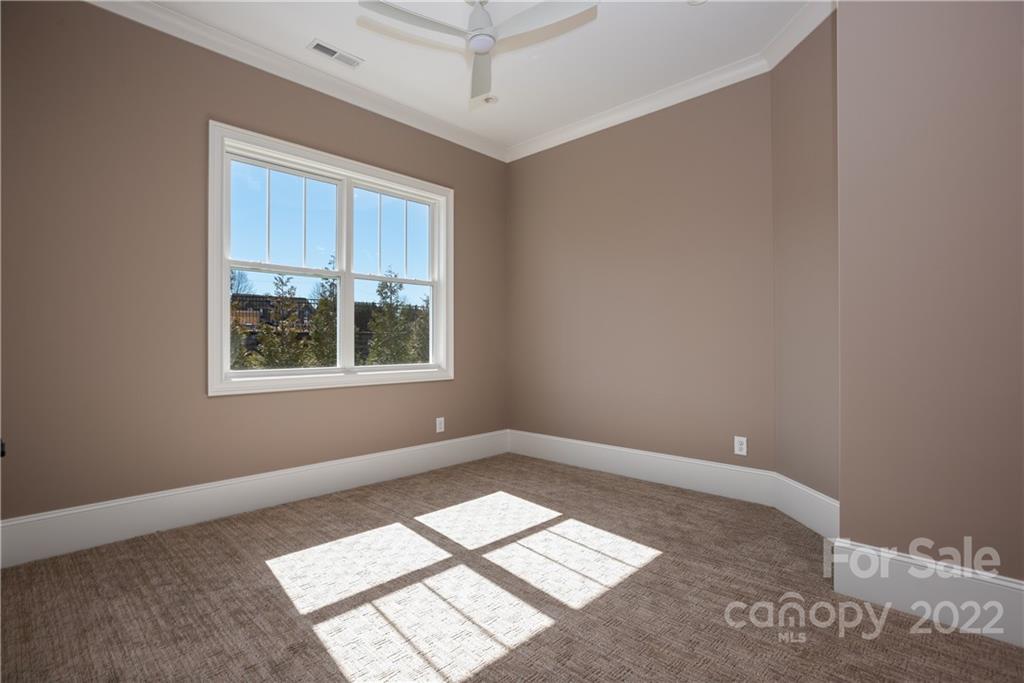 811 Naples Drive Davidson, NC 28036 - Photo 27 of 31 an empty room with a window