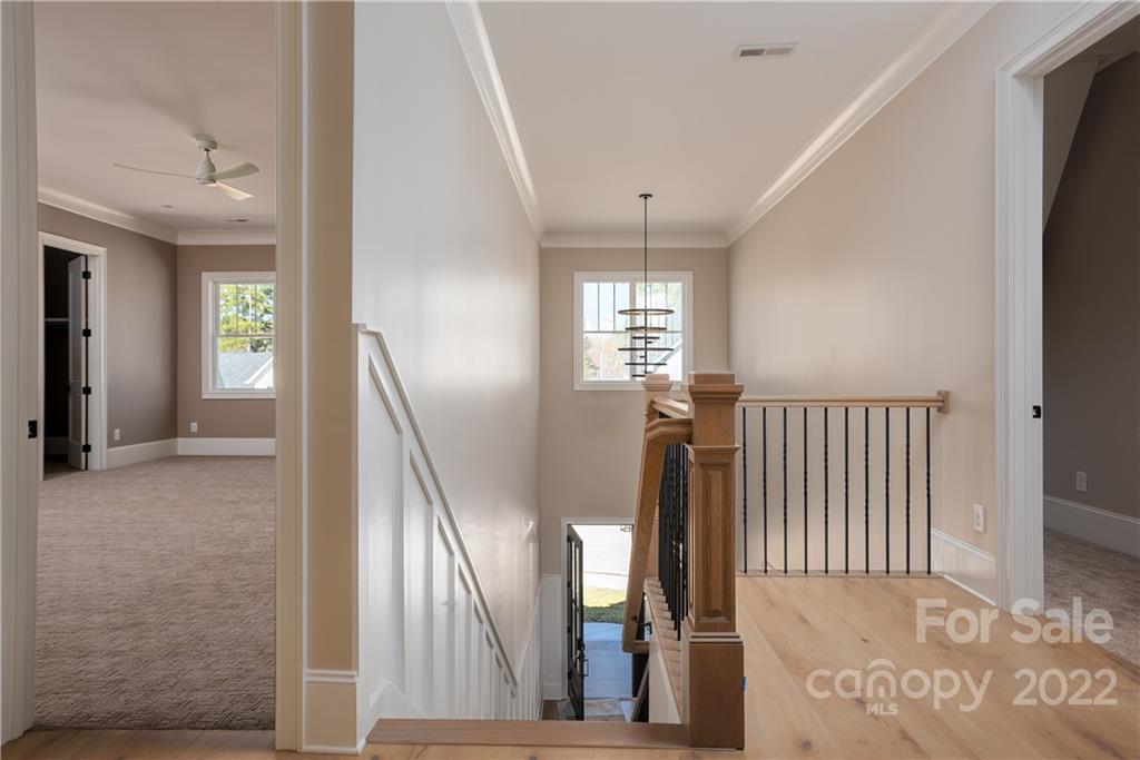 811 Naples Drive Davidson, NC 28036 - Photo 28 of 31 a view of entryway and hall with wooden floor