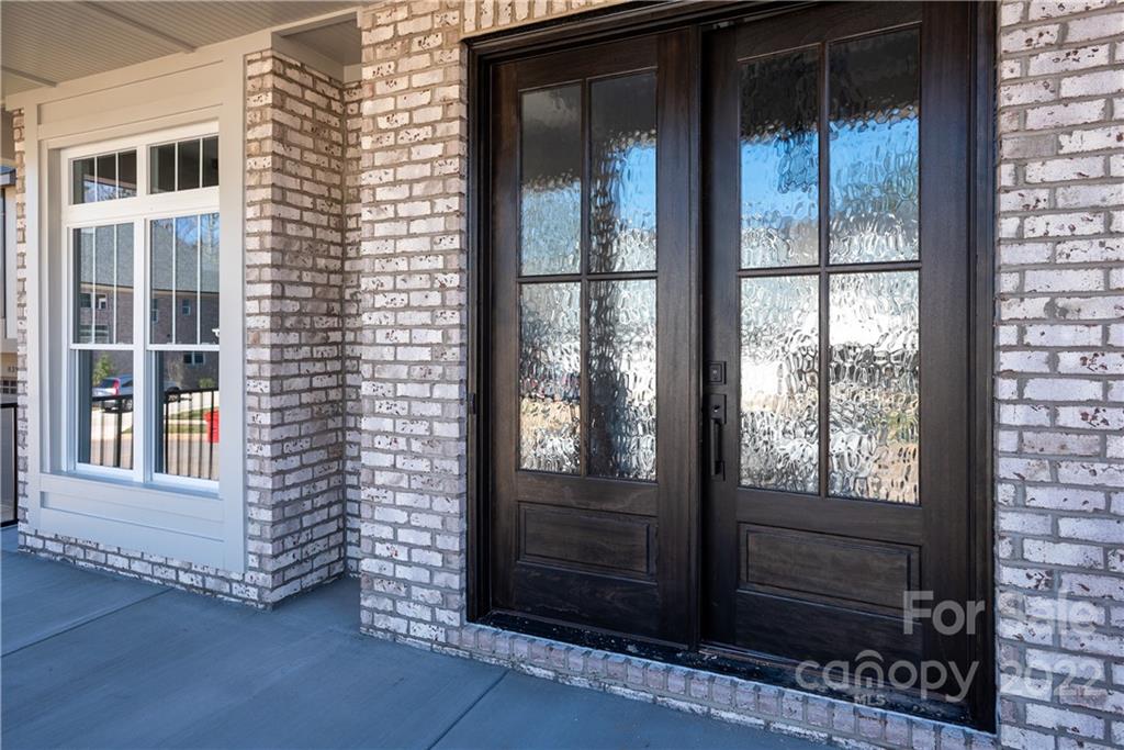 811 Naples Drive Davidson, NC 28036 - Photo 3 of 31 a view of front door of house