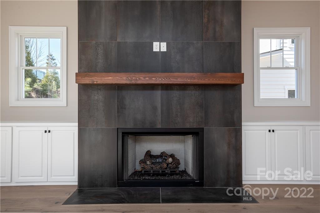 811 Naples Drive Davidson, NC 28036 - Photo 8 of 31 a room with a fireplace
