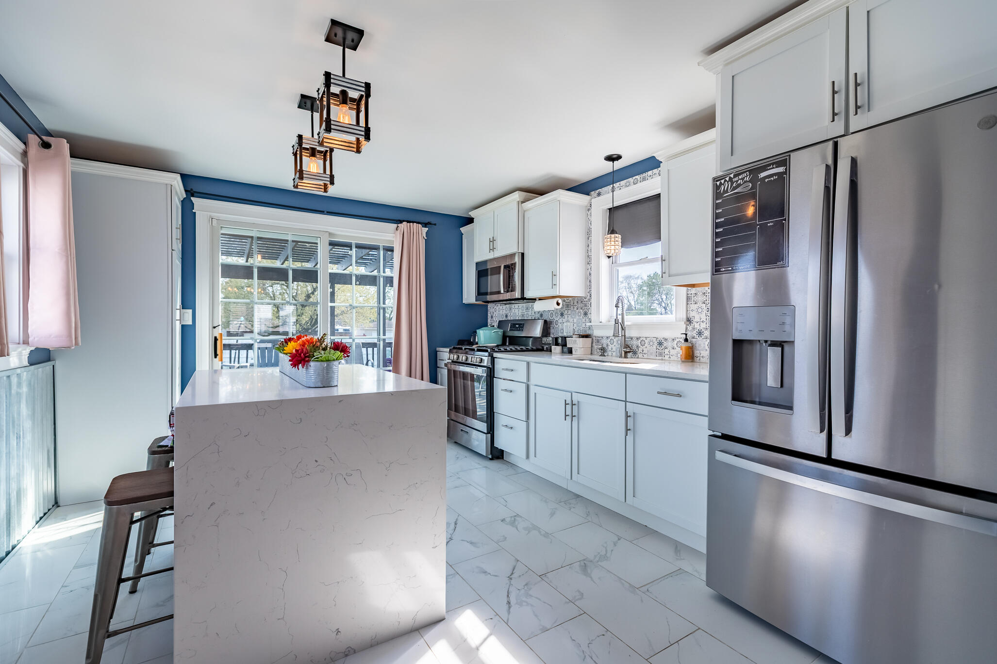 2936 Janet Place Hammond, IN 46323 - Photo 13 of 28 a kitchen with stainless steel appliances a refrigerator sink and cabinets