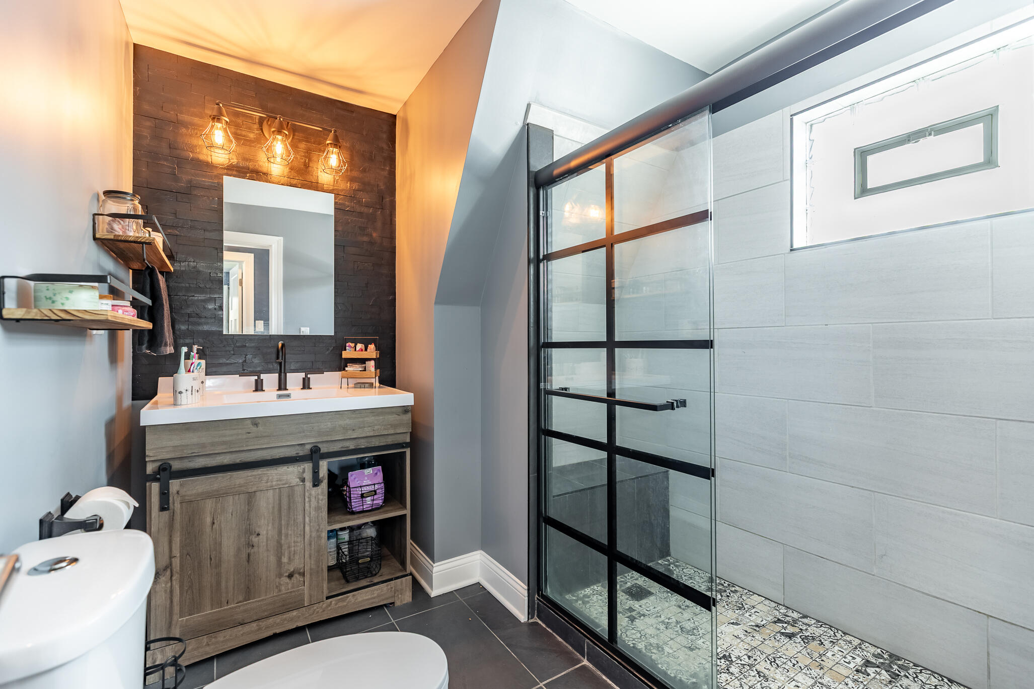 2936 Janet Place Hammond, IN 46323 - Photo 18 of 28 a bathroom with a sink toilet and shower