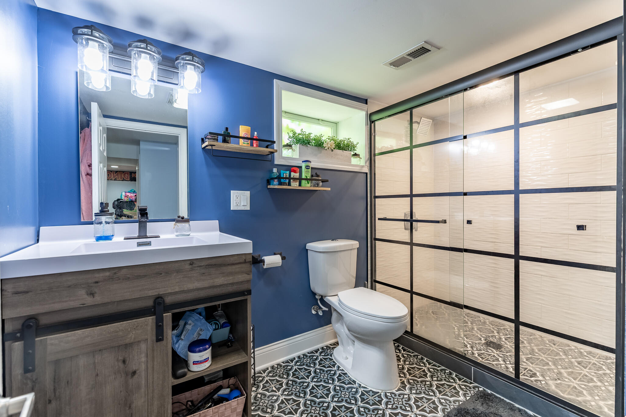 2936 Janet Place Hammond, IN 46323 - Photo 23 of 28 a bathroom with a sink toilet and mirror