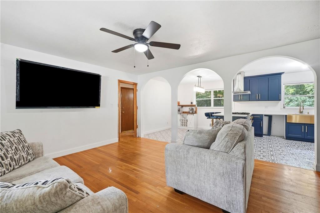 430 Church Road Southwest Marietta, GA 30060 - Photo 6 of 35 a living room with furniture and a flat screen tv