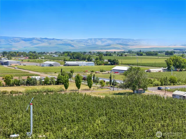 a view of a city with lawn chairs