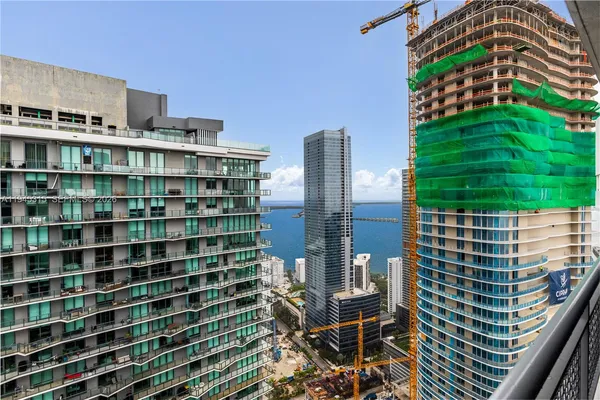 a view of a city with tall buildings