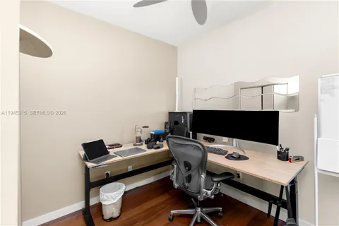 a view of a workspace with furniture