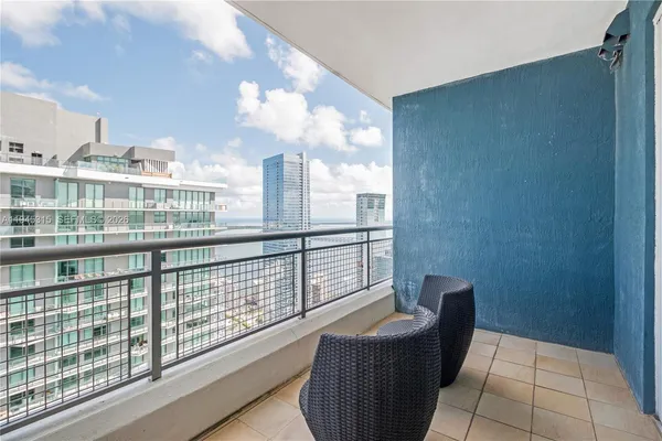 a view of a balcony with a couch