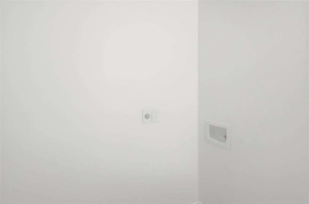 704 Graham Street Cleburne, TX 76033 - Photo 16 of 18 close up of a white marble wall