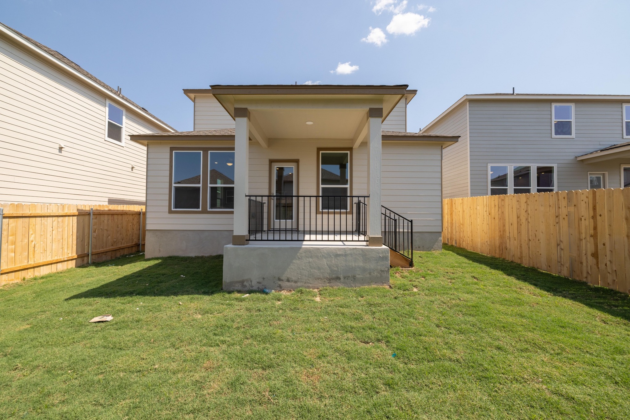 260 Feathers Street Jarrell, TX 76537 - Photo 29 of 34 a view of a house with backyard and garden