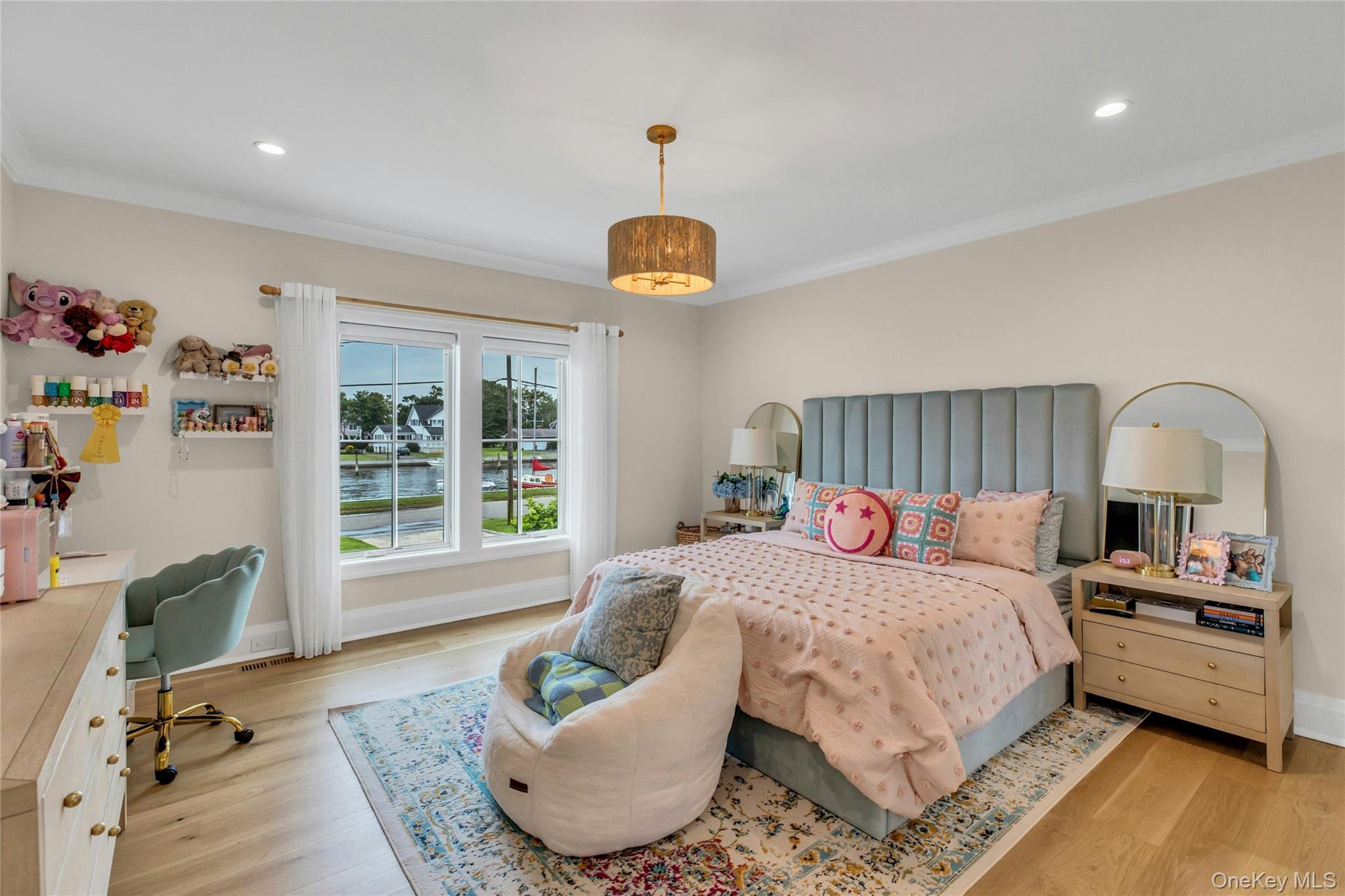 52 Concourse East Brightwaters, NY 11718 - Photo 22 of 49 a bedroom with a bed and a couch