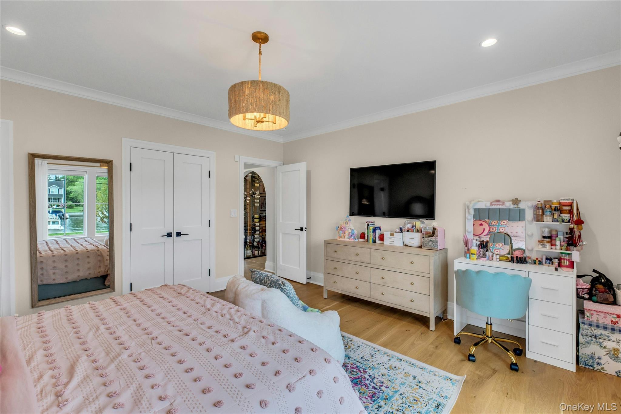 52 Concourse East Brightwaters, NY 11718 - Photo 23 of 49 a view of a bedroom with workspace and window