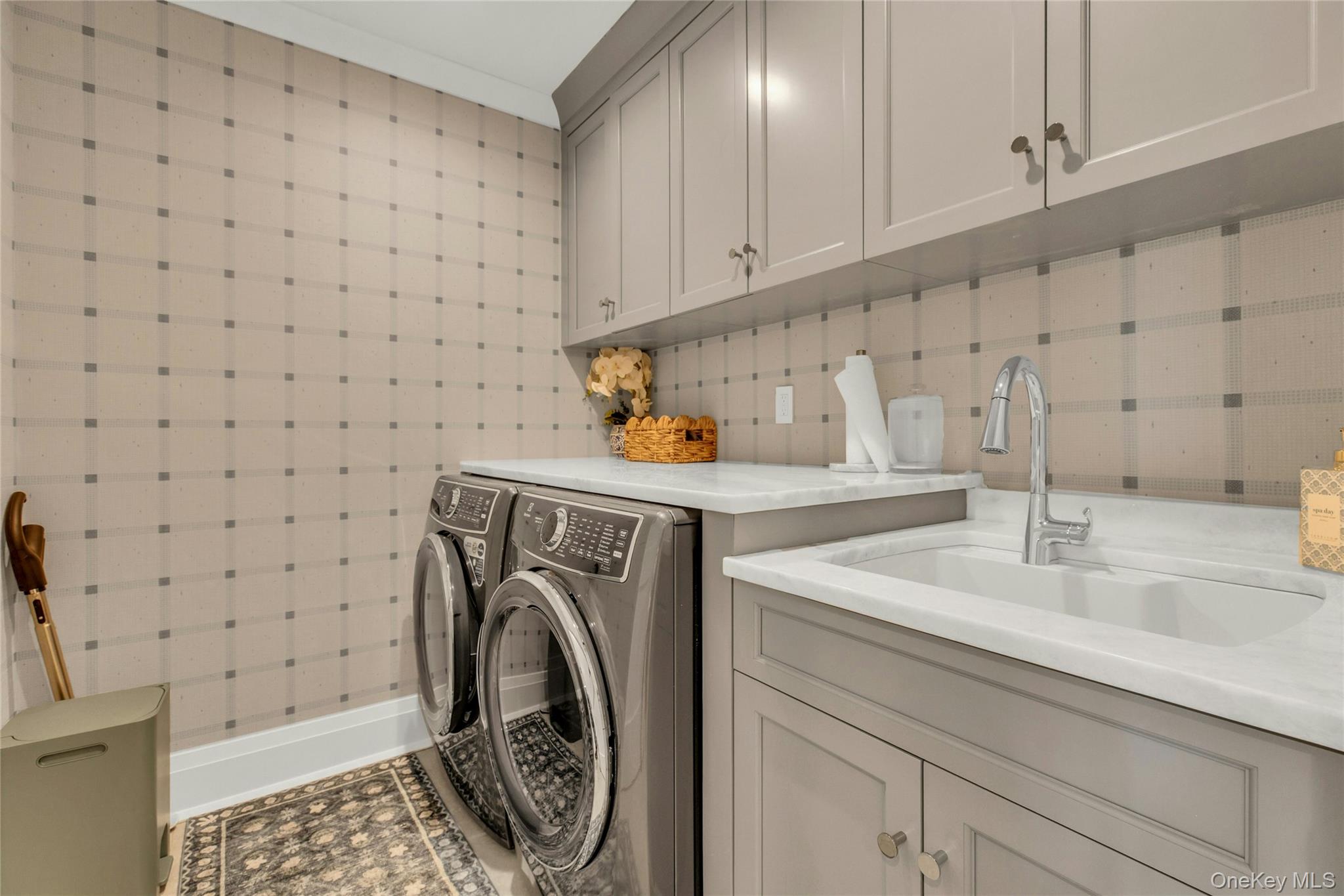 52 Concourse East Brightwaters, NY 11718 - Photo 36 of 49 a utility room with sink dryer and washer